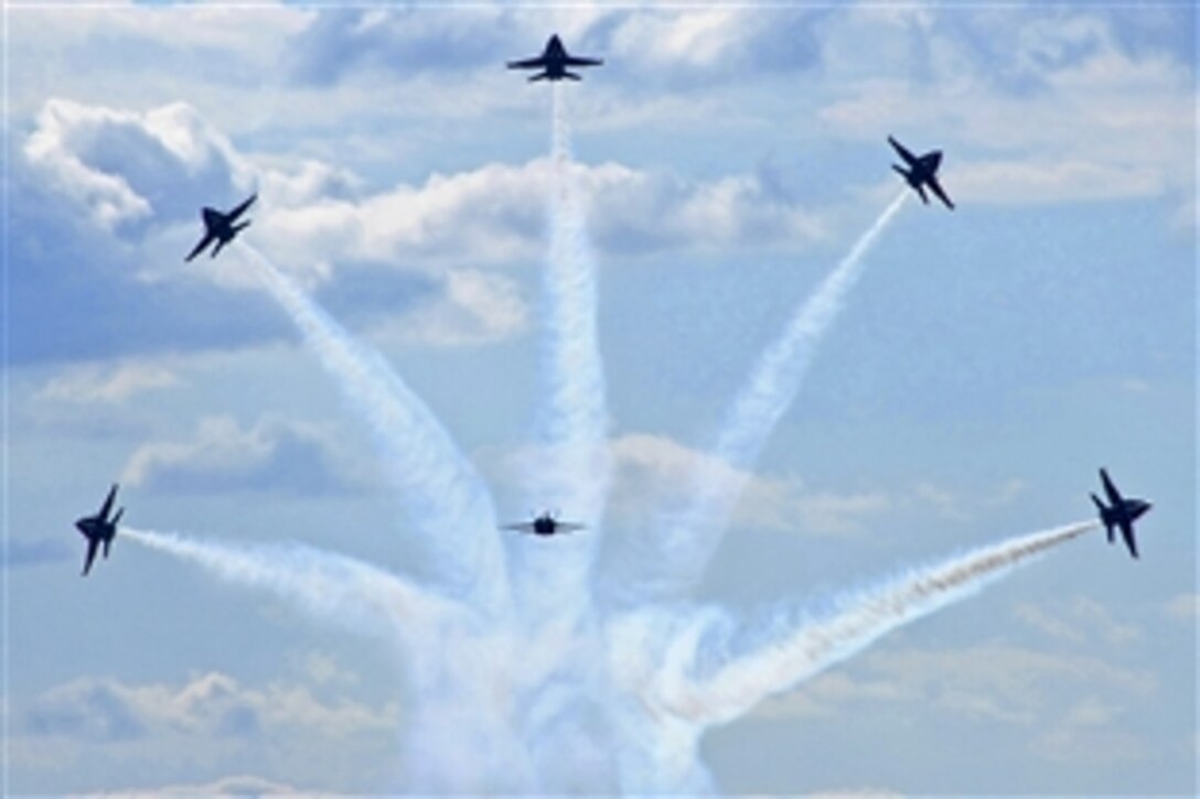 The Navy Blue Angels aerial demonstration team practices for the 2011 Randolph Air Force Base Air Show in San Antonio, Texas, Oct. 27, 2011.