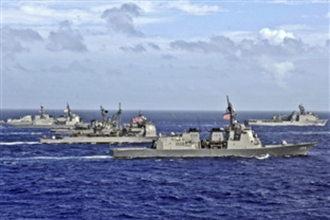 U.S. Navy and Japan Maritime Self Defense Force ships sail in formation during Annual Exercise 2011 in the Pacific Ocean, Nov. 4, 2011. Annual Exercise is a bilateral field-training exercise designed to practice and evaluate the coordination procedures and interoperability elements required to effectively and mutually respond to the defense of Japan, to a regional crisis or contingency situation in the Asia-Pacific region, while building bilateral confidences and working relationships.