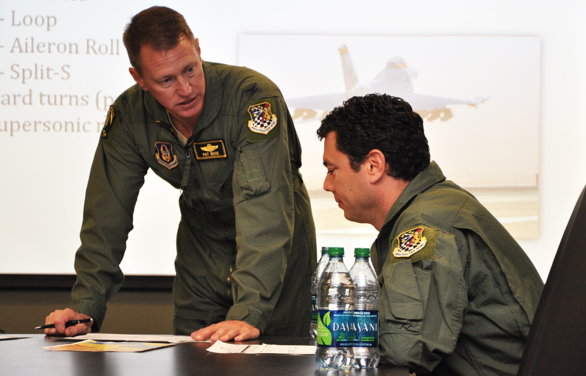 Col. Patrick Wade, 419th Vice Commander, briefs Congressman Jason Chaffetz in preparation for an F-16 familiarization flight. Wade told him about the various maneuvers he was planning to perform while in the air and some safety precautions they would take in the event of an emergency. (U.S. Air Force photo/Tech Sgt. Richard Gonzales)