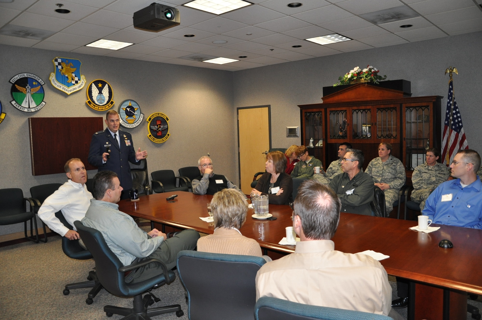 Col. William H. Mason, commander of the 931st Air Refueling Group, McConnell Air Force Base, Kan., presents a unit mission briefing to a group of 931st honorary commanders, Nov. 5, 2011.  The purpose of the honorary commander program is to develop strong ties between the leaders of the 931st and the leaders of local communities.  (U.S. Air Force photo by Tech. Sgt. Brannen Parrish)