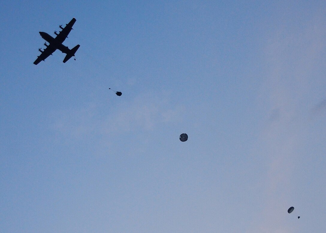 Students with the 23rd Special Tactics Training Squadron, trail out of a MC-130E Combat Talon I after jumping from the aircraft during a recent two-day exercise at Duke Field Fla.  The aircrew of reservists delivered approximately six Hurlburt Field Airmen and their equipment to their coordinates to begin the exercise.  The exercise provided counter-insurgency tactics, land navigation and mission planning to potential Air Force combat controllers.  (U.S. Air Force photo/Tech. Sgt. Cheryl Foster)