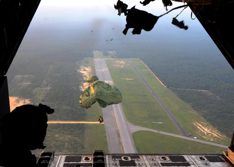Students with the 23rd Special Tactics Training Squadron, leap from a MC-130E Combat Talon I from the 919th Special Operations Wing during a recent mission as part of a two-day exercise at Duke Field, Fla.  The aircrew of reservists delivered approximately six Hurlburt Field Airmen and their equipment to their coordinates to begin the exercise.  The exercise provided counter-insurgency tactics, land navigation and mission planning to potential Air Force combat controllers.  (U.S. Air Force photo/Tech. Sgt. Cheryl Foster)