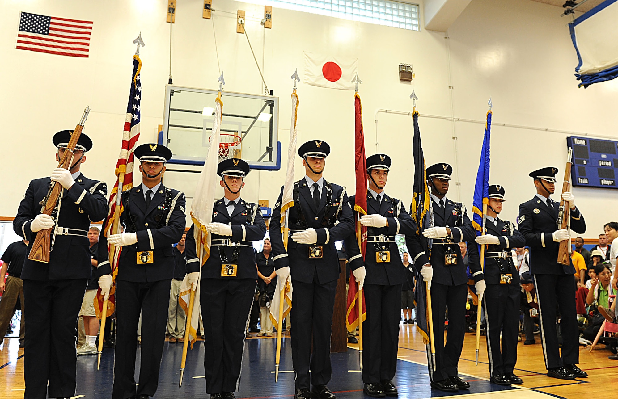 The Kadena Air Base Honor Guard presents the colors during the opening ceremony of the Kadena Special Olympics on Kadena Air Base, Japan, Nov. 5, 2011. This year marks the 12th Annual KSO, a sporting event dedicated to enriching the lives of special-needs individuals while strengthening U.S. - Okinawa relationships. (U.S. Air Force photo/Airman 1st Class Brooke P. Beers/released)