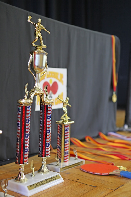 The awards for the 4th Annual Camp Lejeune Ping Pong Tournament at the Jacksonville USO was displayed during the tournament Nov. 6. The Camp Lejeune Ping Pong Club gives members the opportunity to meet new people. (Official U.S. Marine Corps photo by Pfc. Jackeline M. Perez Rivera)