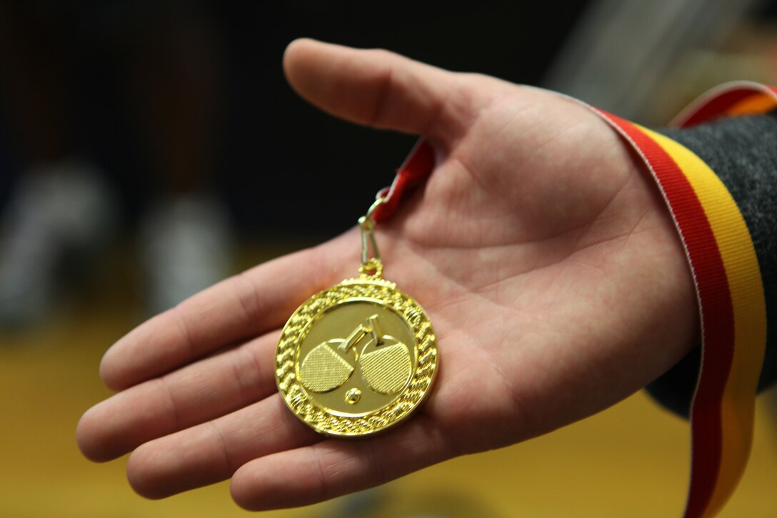 Second and third place winners won a medal at the 4th Annual Camp Lejeune Ping Pong Tournament at the Jacksonville USO Nov. 6. The Ping Pong Club aims to hold a sanctioned tournament early next year. (Official U.S. Marine Corps photo by Pfc. Jackeline M. Perez Rivera)