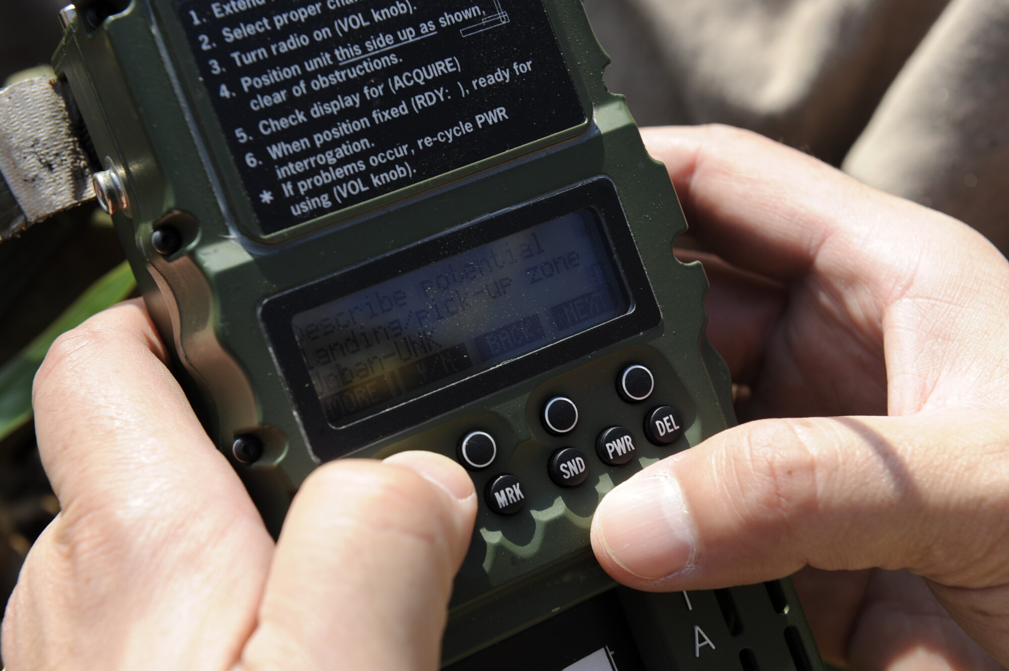 U.S. Air Force Lt. Col. Pete Ortiz Jr., 33rd Rescue Squadron director of operations on Kadena Air Base, Japan, sends a helicopter rescue request message during exercise PACIFIC THUNDER Nov. 3 near Osan Air Base, Republic of Korea.
PACIFIC THUNDER is a 10-day exercise from Oct. 31 to Nov. 9 at Osan AB. The exercise involves the 33rd Rescue Squadron from Kadena AB, Japan, and the 25th Fighter Squadron from Osan. These units work together to practice combat search and rescue tactics to prepare for real-world emergency situations. (U.S. Air Force photo/Tech. Sgt. Angelique Bilog/released)
