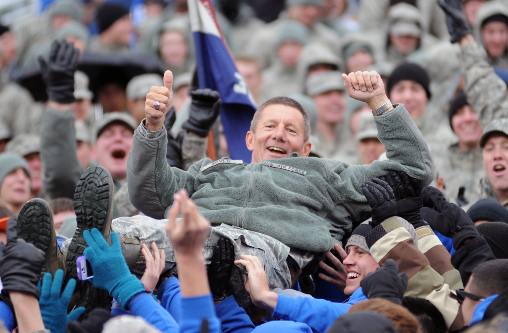 Academy Superintendent Lt. Gen. Mike Gould crowd surfs during the Air Force-Army game at Falcon Stadium Nov. 5, 2011. The Falcons scored 21 points in the third quarter en route to a 24-14 victory over the Black Knights and their second consecutive Commander-in-Chief's Trophy. (U.S. Air Force photo/Tech. Sgt. Raymond Hoy)