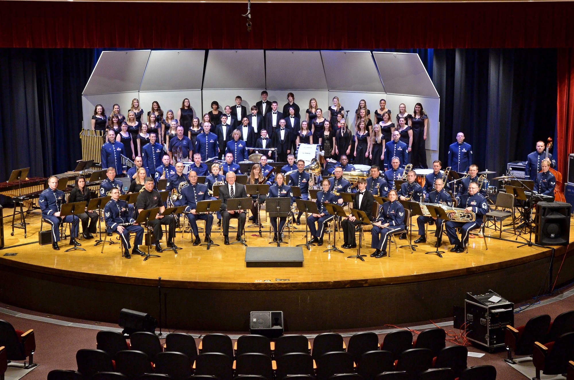 Members of The Air National Guard Band of the Northwest, also known as the 560th Air Force Band, choir students from Shadle Park and Rogers High Schools, instrumentalists from Coeur D’Alene High School, Eastern Washington University and 560th alumni, pose for a photo before performing a musical “Salute to Veterans” honoring military members past and present in anticipation of Veteran’s Day at Spokane Falls Community College.  (U.S. Air Force photo/Staff Sgt. Anthony Ennamorato)
