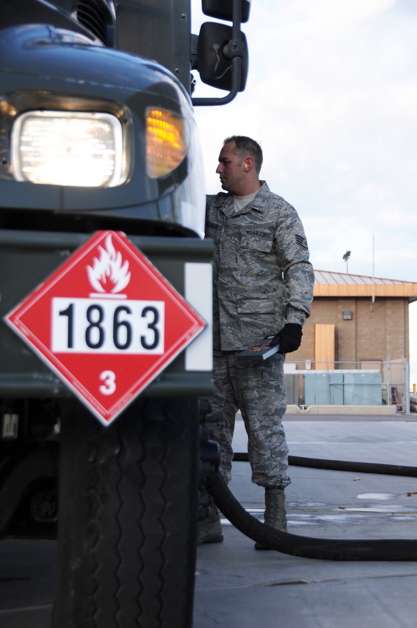 Staff Sgt. Donovan Walden, 161st Logistics Readiness Group fuels technician, monitors the gauges on a fuel truck as part of a routine inspection during an aircraft generation exercise, Phoenix, Nov. 5, 2011. In order to maintain safety on the flightline, these six thousand gallon fuel trucks are inspected daily for leaks and cracks in the pipes. (U.S. Air Force Photo by Staff Sgt. Courtney Enos/Released)
