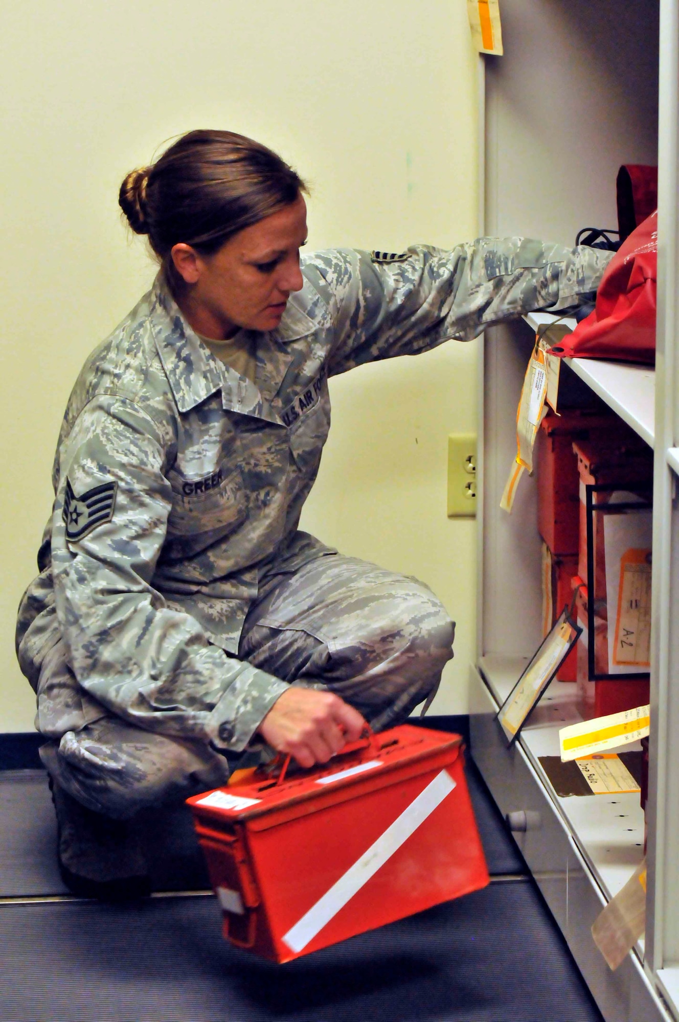 PATRICK AIR FORCE BASE, Fla. - Staff Sgt. Stacie Greer, aircrew flight equipment specialist, 920th Operations Support Squadron, switches out equipment during the post-flight checklist for the Cocoa Beach Air Show Nove 4-5. AFE specialists typically take about 30 minutes to prepare the life support gear for the next day following a flight. (U.S. Air Force Photo/Capt. Ryan Liss)