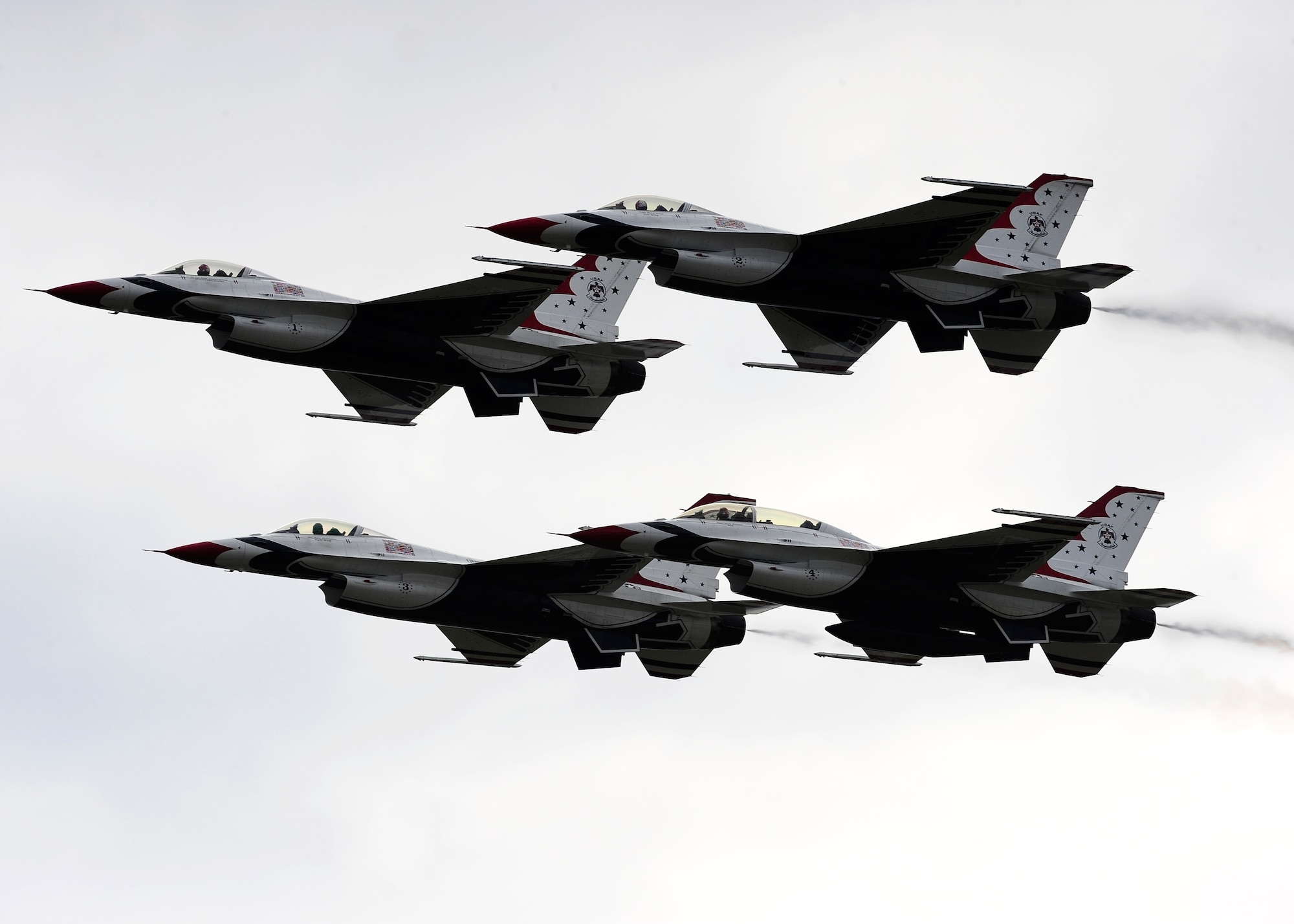 The U.S. Air Force Thunderbirds air demonstration team flies in a tight formation over MacDill Air Force Base, Fla., during AirFest, Nov. 5, 2011. The 2011 AirFest was host to spectacular aerial demonstrations, static displays and featured the Thunderbirds. AirFest gave the Tampa Bay community the opportunity to witness firsthand the capabilities of the armed forces. With an estimated turnout of 80,000 spectators, day one of the two-day air show was a success. (U.S. Air Force Photo by Airman 1st  Class Melanie Bulow-Gonterman)