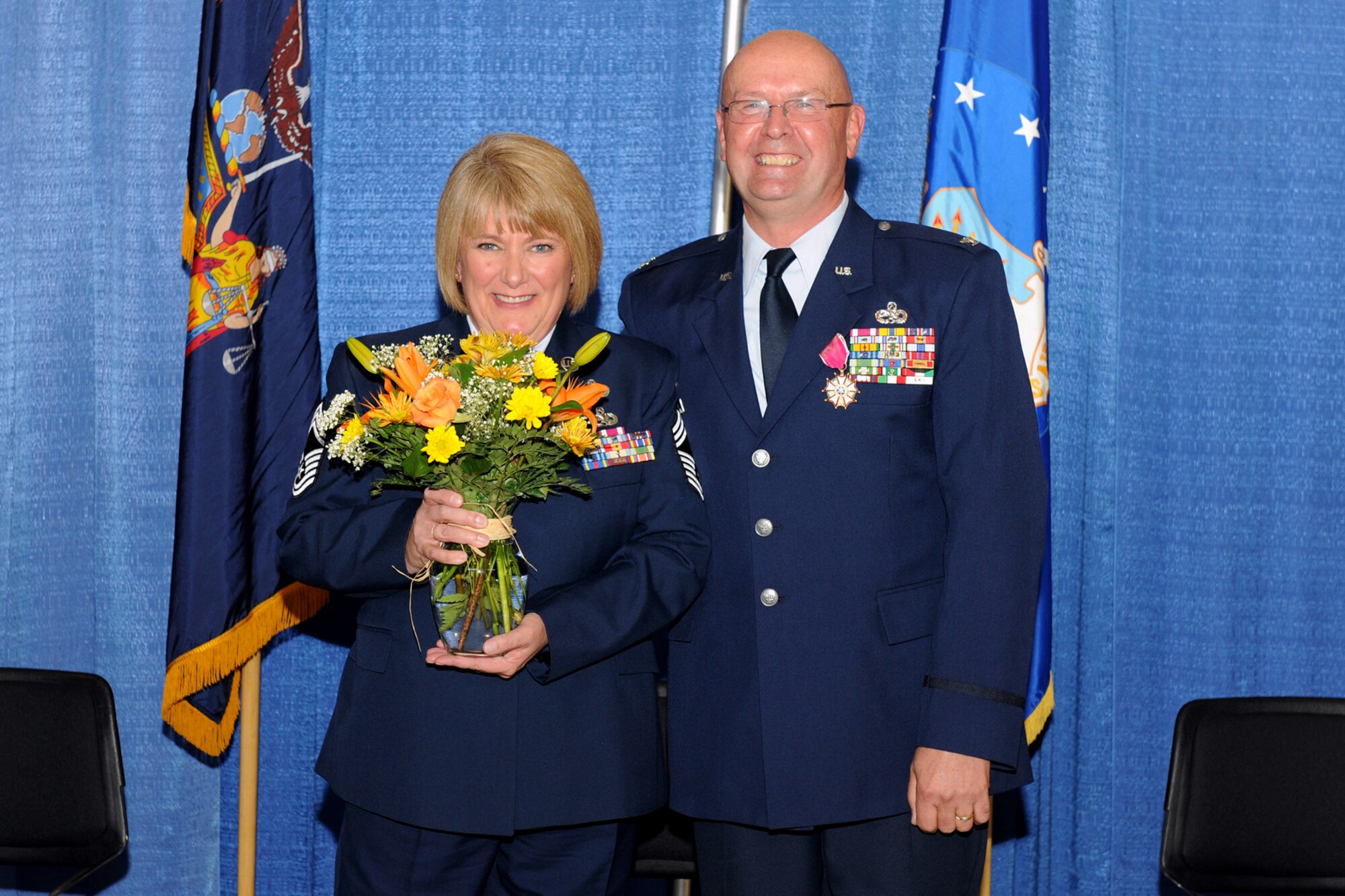 U.S. Air Force Chief Master Sgt. Judy Van Wie (retired) and Col. Harvey Van Wie Col. Harvey (retired) are all smiles during a retirement ceremony held for Col. Van Wie on 5 November 2011 at Hancock Field Air National Guard Base, Syracuse, NY. Col. Van Wie enlisted in the Air Force in 1970 and was the last member of the 174th Fighter Wing to have served in the Vietnam War.