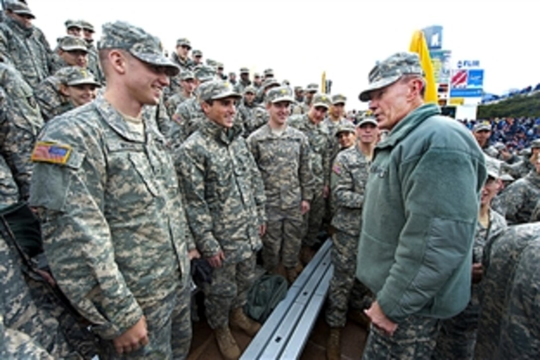 Army Gen. Martin E. Dempsey, chairman of the Joint Chiefs of Staff, right, talks with Army cadets during the annual Army-Air Force football game at the Air Force Academy in Colorado Springs, Colo., Nov. 5, 2011. Air Force defeated Army. 24-14 in the teams' 46th match. 