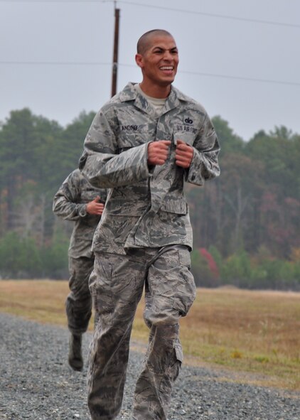 CAMP MINDEN, La. -- Tech. Sgt. Kyle Andino, 91st Security Forces Group, completes the last sprint of the competition to complete the obstacle course. Security forces Airmen from the 91st Missile Wing competed against other Air Force Global Strike Command security forces teams in the second annual Global Strike Challenge here, Nov. 5-7.  Each team was judged on completing various tasks during the competition to include their knowledge of tactical maneuvers as a team and as individuals, weapons familiarity, and overall job knowledge. (U.S. Air Force photo/ Airman 1st Class Jessica McConnell)