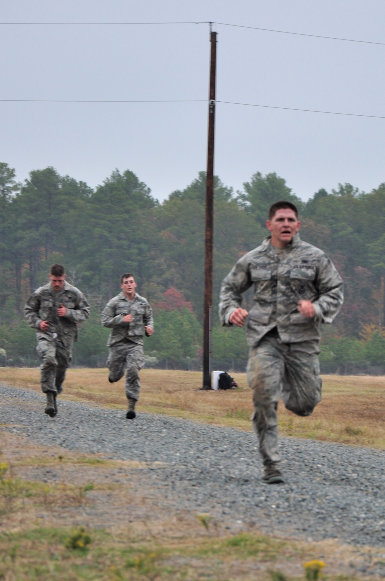 CAMP MINDEN, La. -- Security forces Airmen from the 91st Missile Wing competed against other Air Force Global Strike Command security forces teams in the second annual Global Strike Challenge here, Nov. 5-7. Here, 91st Security Forces Group Airmen complete the individual movement phase of the competition, which challenged Airmen to sprint, low crawl, high crawl and more. Each team was judged on completing various tasks during the competition to include their knowledge of tactical maneuvers as a team and as individuals, weapons familiarity, and overall job knowledge. (U.S. Air Force photo/ Airman 1st Class Jessica McConnell)
