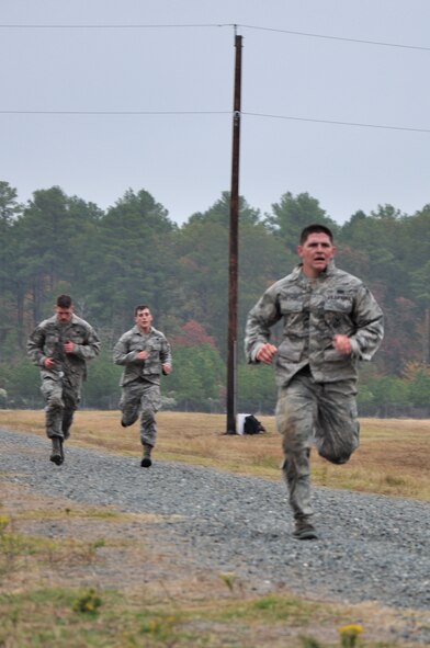 CAMP MINDEN, La. -- Security forces Airmen from the 91st Missile Wing competed against other Air Force Global Strike Command security forces teams in the second annual Global Strike Challenge here, Nov. 5-7. Here, 91st Security Forces Group Airmen complete the individual movement phase of the competition, which challenged Airmen to sprint, low crawl, high crawl and more. Each team was judged on completing various tasks during the competition to include their knowledge of tactical maneuvers as a team and as individuals, weapons familiarity, and overall job knowledge. (U.S. Air Force photo/ Airman 1st Class Jessica McConnell)
