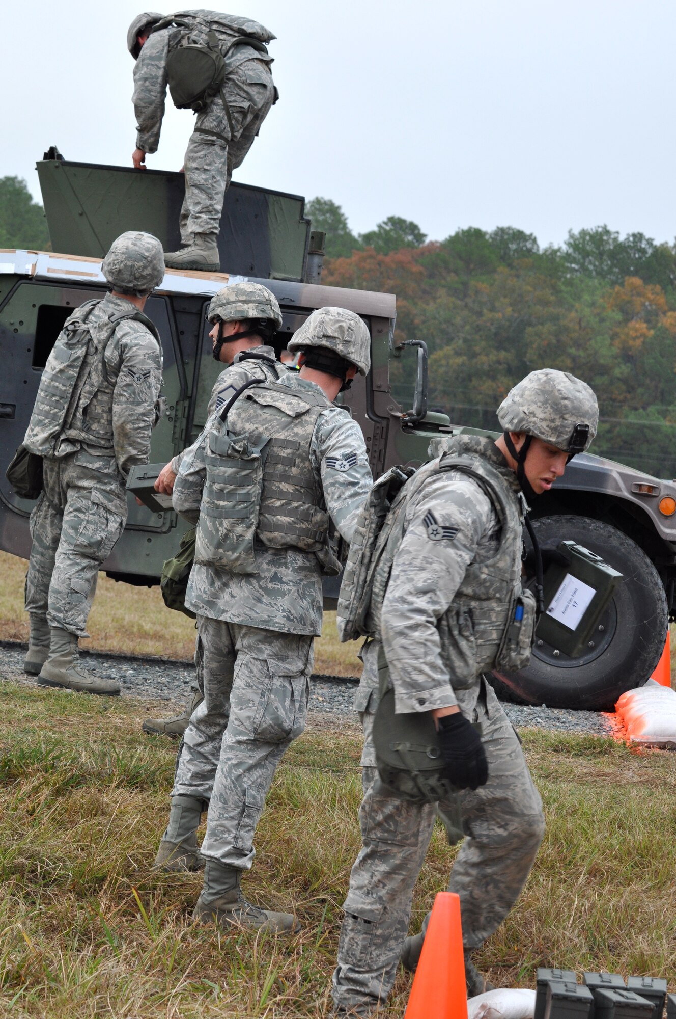 CAMP MINDEN, La. -- Security forces Airmen from the 5th Bomb Wing competed against other Air Force Global Strike Command security forces teams in the second annual Global Strike Challenge here, Nov. 5-7. Here, 5th Security Forces Squadron Airmen complete the ammunition canister movement phase of the competition. Each team was judged on completing various tasks during the competition to include their knowledge of tactical maneuvers as a team and as individuals, weapons familiarity, and overall job knowledge. (U.S. Air Force photo/ Airman 1st Class Jessica McConnell)