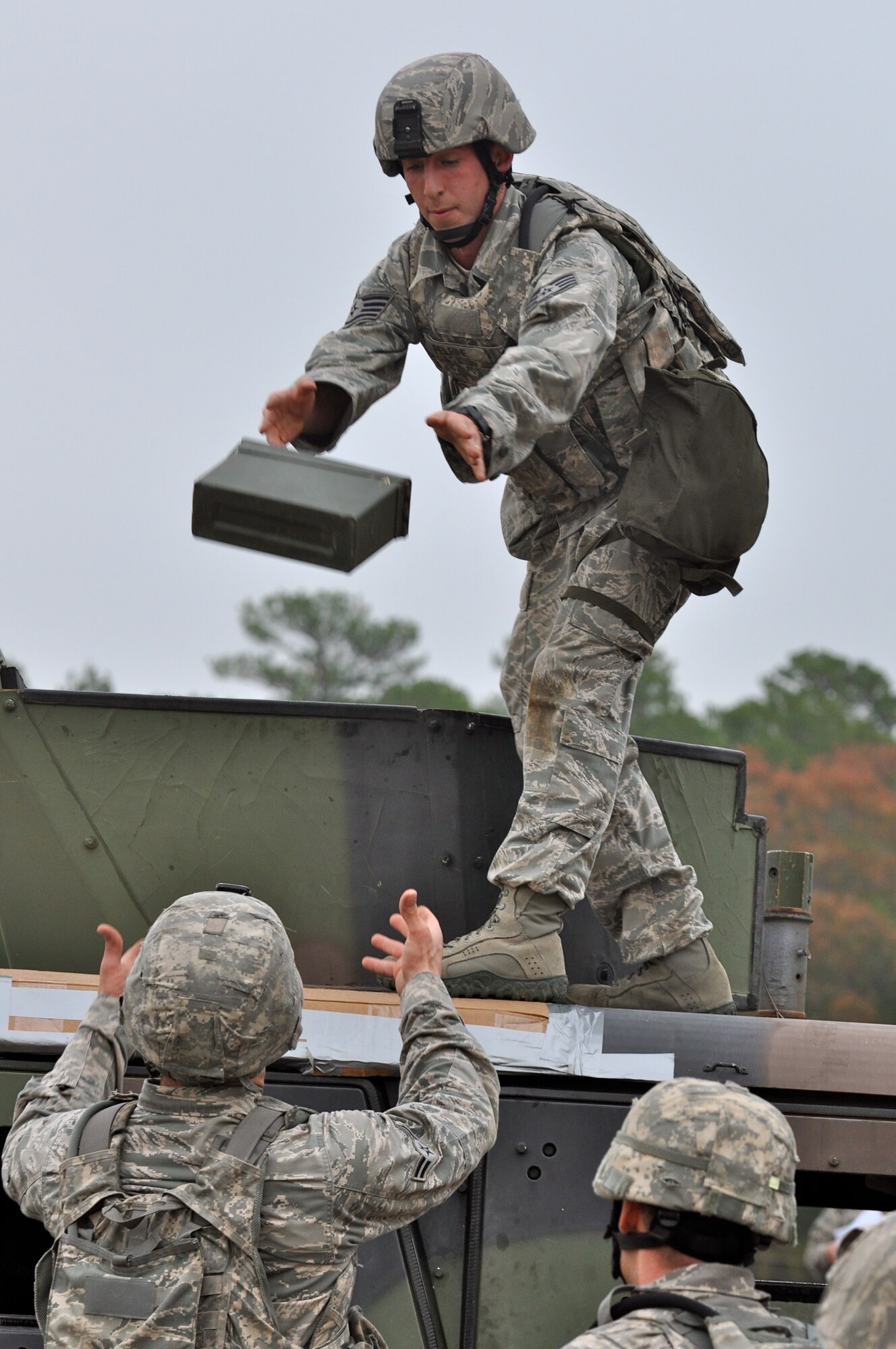 CAMP MINDEN, La. -- Security forces Airmen from the 5th Bomb Wing competed against other Air Force Global Strike Command security forces teams in the second annual Global Strike Challenge here, Nov. 5-7. Here, 5th Security Forces Squadron Airmen complete the ammunition canister movement phase of the competition. Each team was judged on completing various tasks during the competition to include their knowledge of tactical maneuvers as a team and as individuals, weapons familiarity, and overall job knowledge. (U.S. Air Force photo/ Airman 1st Class Jessica McConnell)