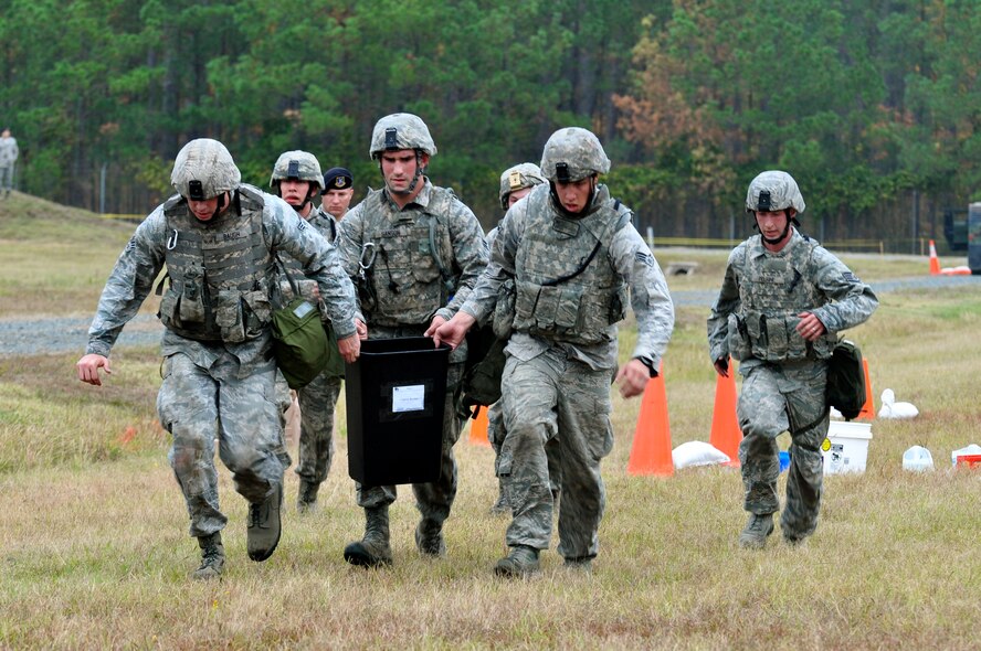 CAMP MINDEN, La. -- Security forces Airmen from the 5th Bomb Wing competed against other Air Force Global Strike Command security forces teams in the second annual Global Strike Challenge here, Nov. 5-7. Here, 5th Security Forces Squadron Airmen complete the water movement phase of the competition. Each team was judged on completing various tasks during the competition to include their knowledge of tactical maneuvers as a team and as individuals, weapons familiarity, and overall job knowledge. (U.S. Air Force photo/ Airman 1st Class Jessica McConnell)