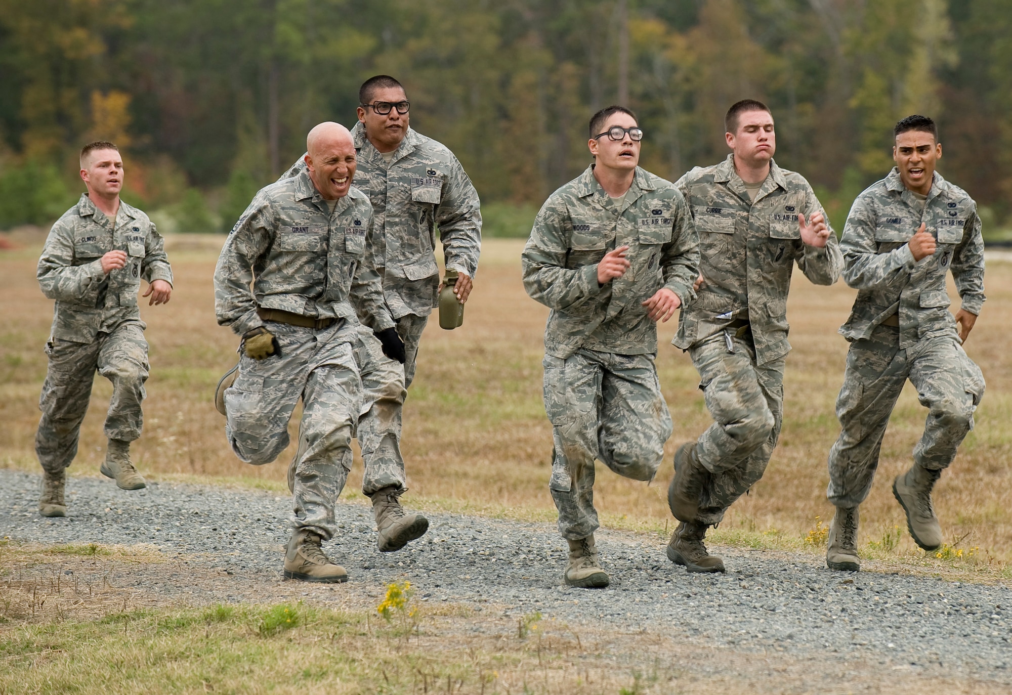 Members of the 90th Security Forces Group sprint toward the finish line of the mental and physical challenge portion of the 2011 Air Force Global Strike Challenge on Camp Minden, La., Nov. 7. The MAP challenge consisted of seven consecutive events designed to test each team's ability to work together. (U.S. Air Force photo/Senior Airman Chad Warren)(RELEASED)