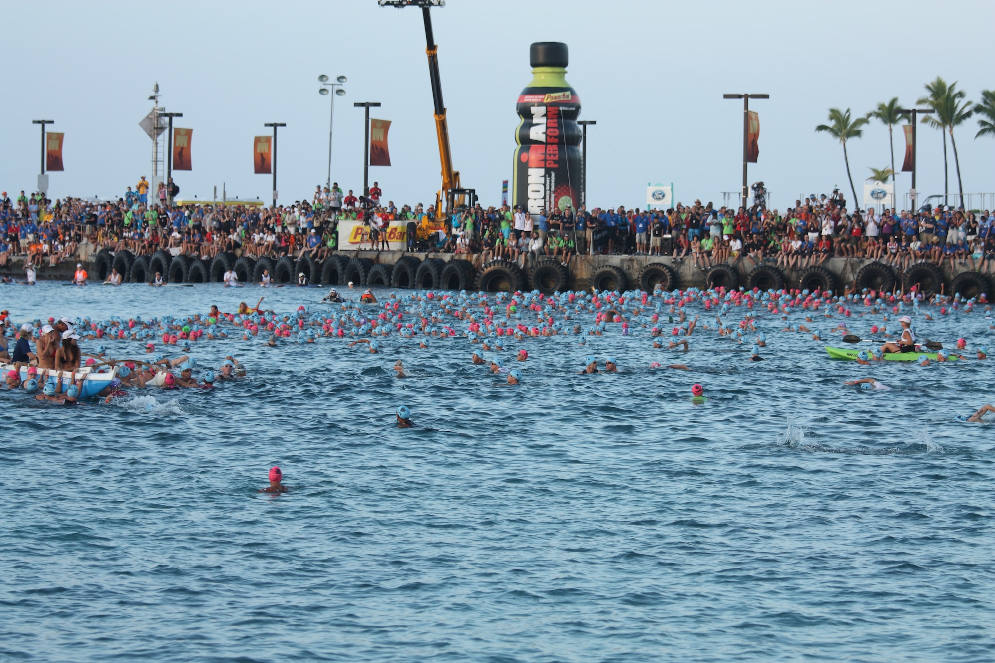 Staff Sgt. Bradley Williams, 51st Maintenance Operations Squadron senior weapons coordinator, waits alongside 1800 competitors at the starting line of the 2011 Ford IRONMAN Championship in Kailua-Kona, Hawaii. Williams finished 32nd in the 25 to 29 age bracket with an official time of 9 hours 36 minutes and 39 seconds. (U.S. Air Force photo/Capt. Ryan Young)