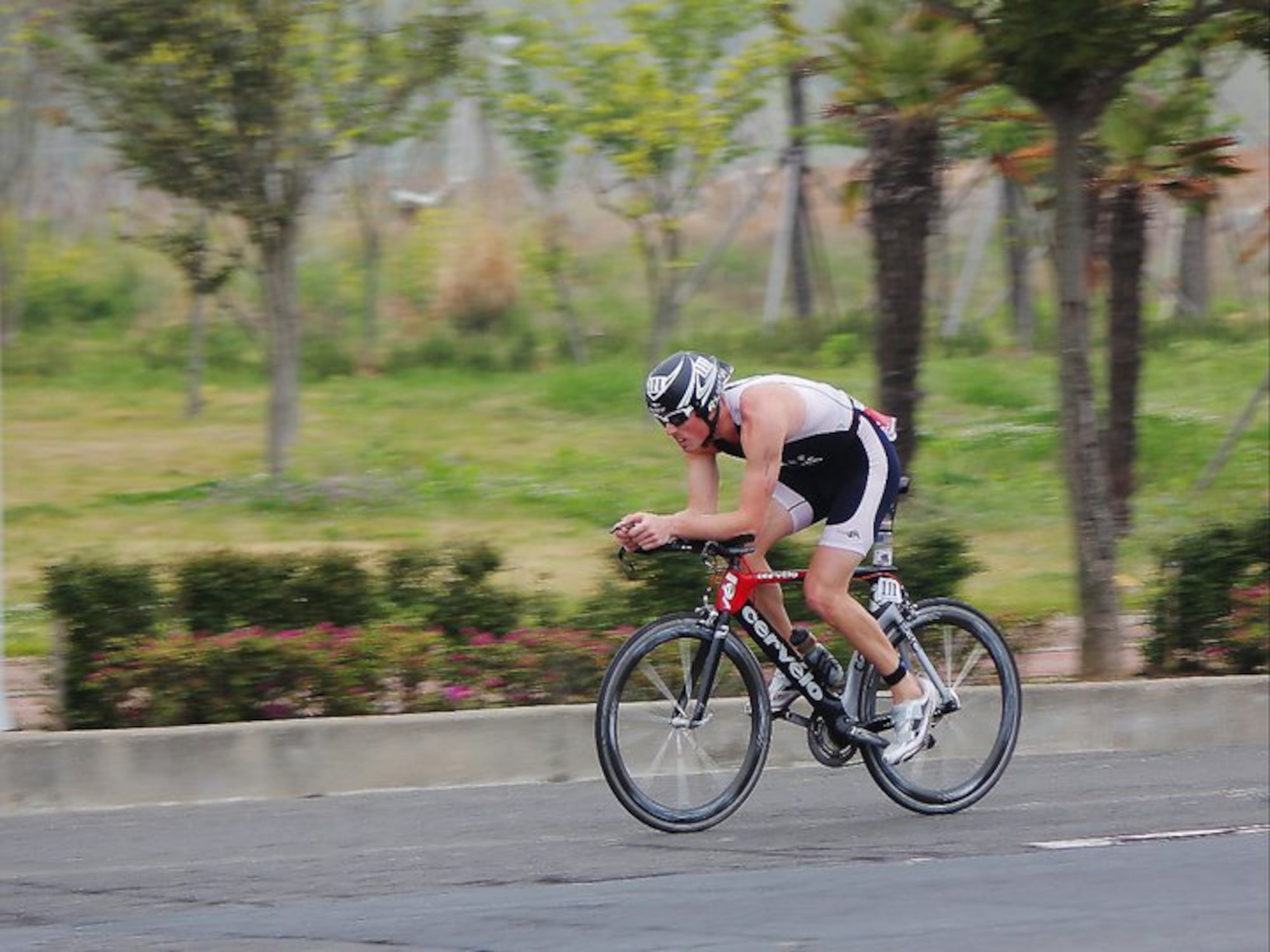 Staff Sgt. Bradley Williams, 51st Maintenance Operations Squadron senior weapons coordinator, participates in an early biking training ride before the 2011 Ford IRONMAN Championship in Kailua-Kona, Hawaii. An IRONMAN challenge consists of a 2.4-mile swim, 112-mile bike race and 26.2-mile run. (Courtesy photo/Jennifer Loos) 