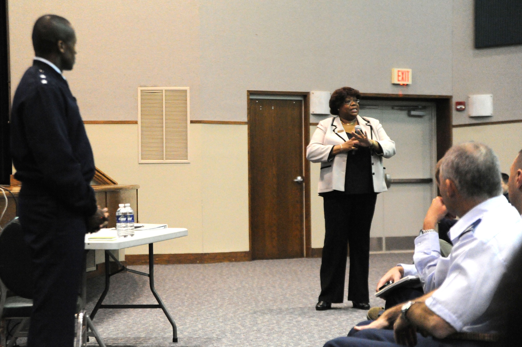 Michele Shamberger, Air Force District of Washington manpower and personnel, gets into the specifics to during the question-and-answer session Nov. 2, 2011 on Joint Base Andrews, Md., at the first of four town hall meetings to discuss Air Force-wide workforce restructuring following the Nov. 2, 2011, Air Force announcement that approximately 4,500 civilian manpower positions must be eliminated in calendar year 2012.