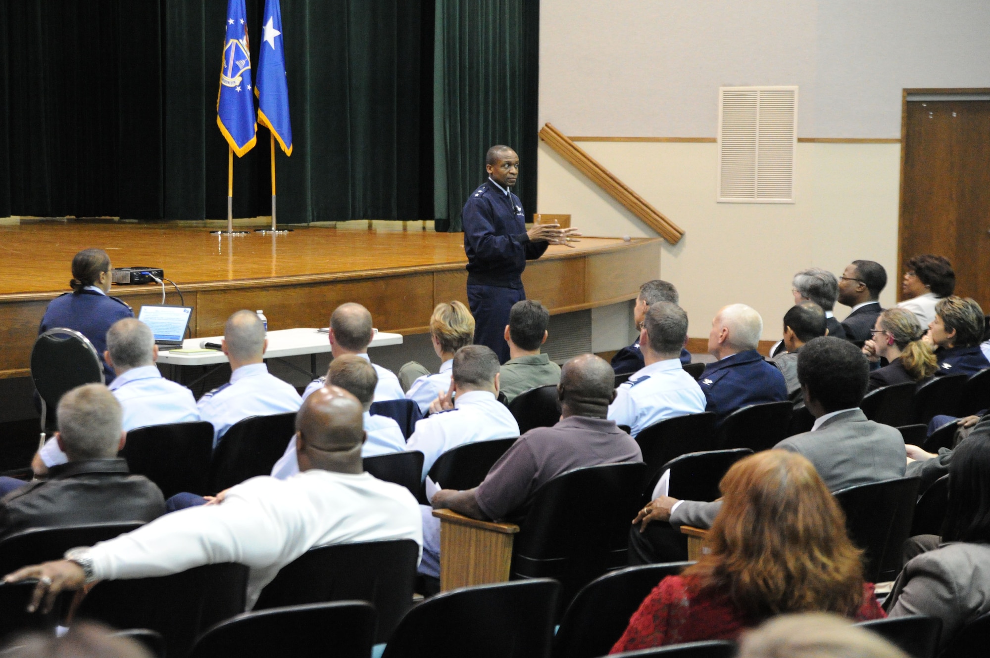 Air Force District of Washington Commander Maj. Gen. Darren McDew held the first of four town hall meetings on Joint Base Andrews, Md., to discuss Air Force-wide workforce restructuring following the Nov. 2, 2011, Air Force announcement that approximately 4,500 civilian manpower positions must be eliminated in calendar year 2012.