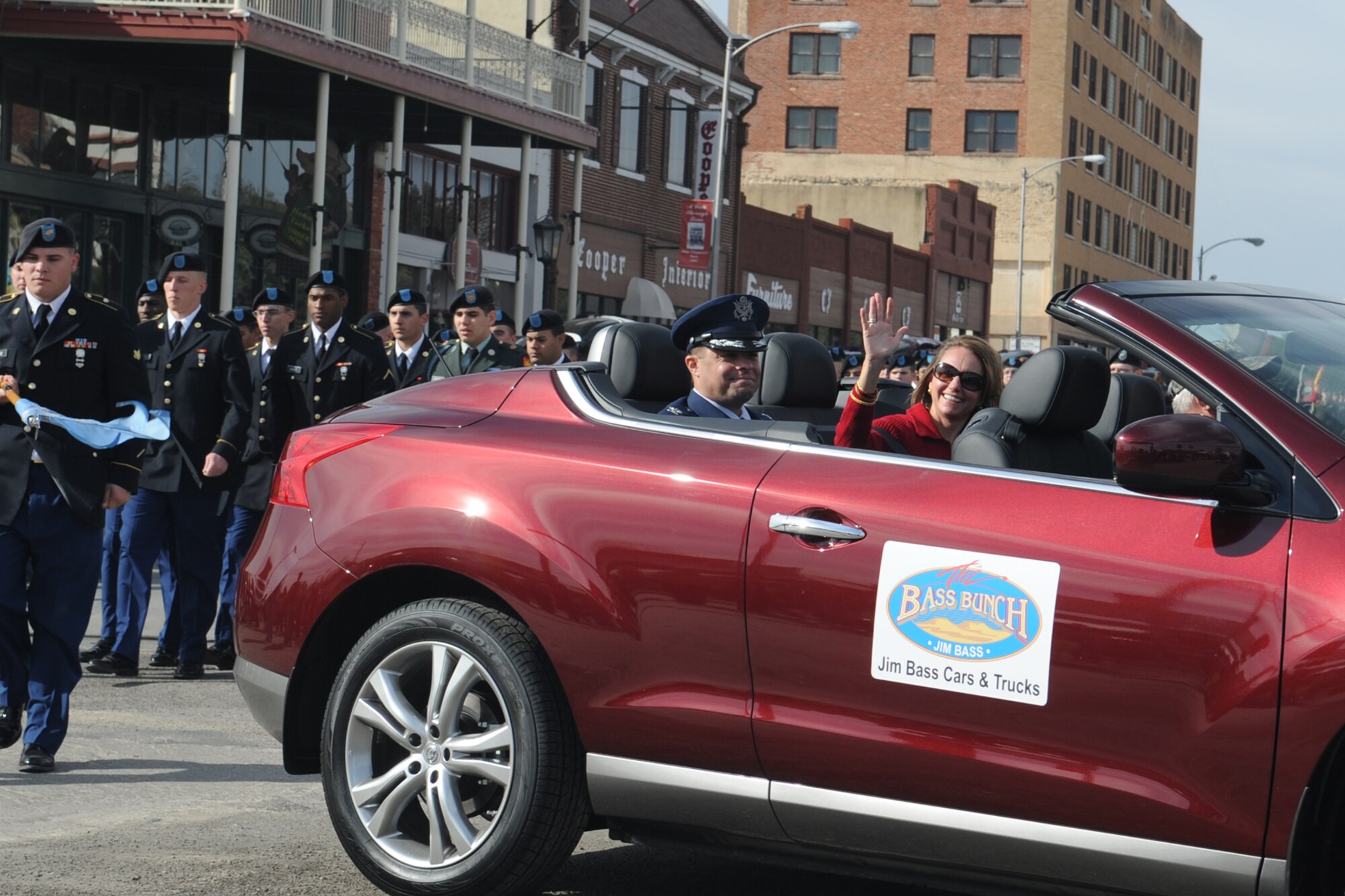 SAN ANGELO, Texas -- Col. Mark Damiano, 17th Training Wing Commander, Goodfellow Air Force Base, and his wife, Ellery, participate in the San Angelo Veterans Day Parade Nov. 5. This was his first major community event since taking command at Goodfellow. (U.S. Air Force photo/Staff Sgt. Laura R. McFarlane)
