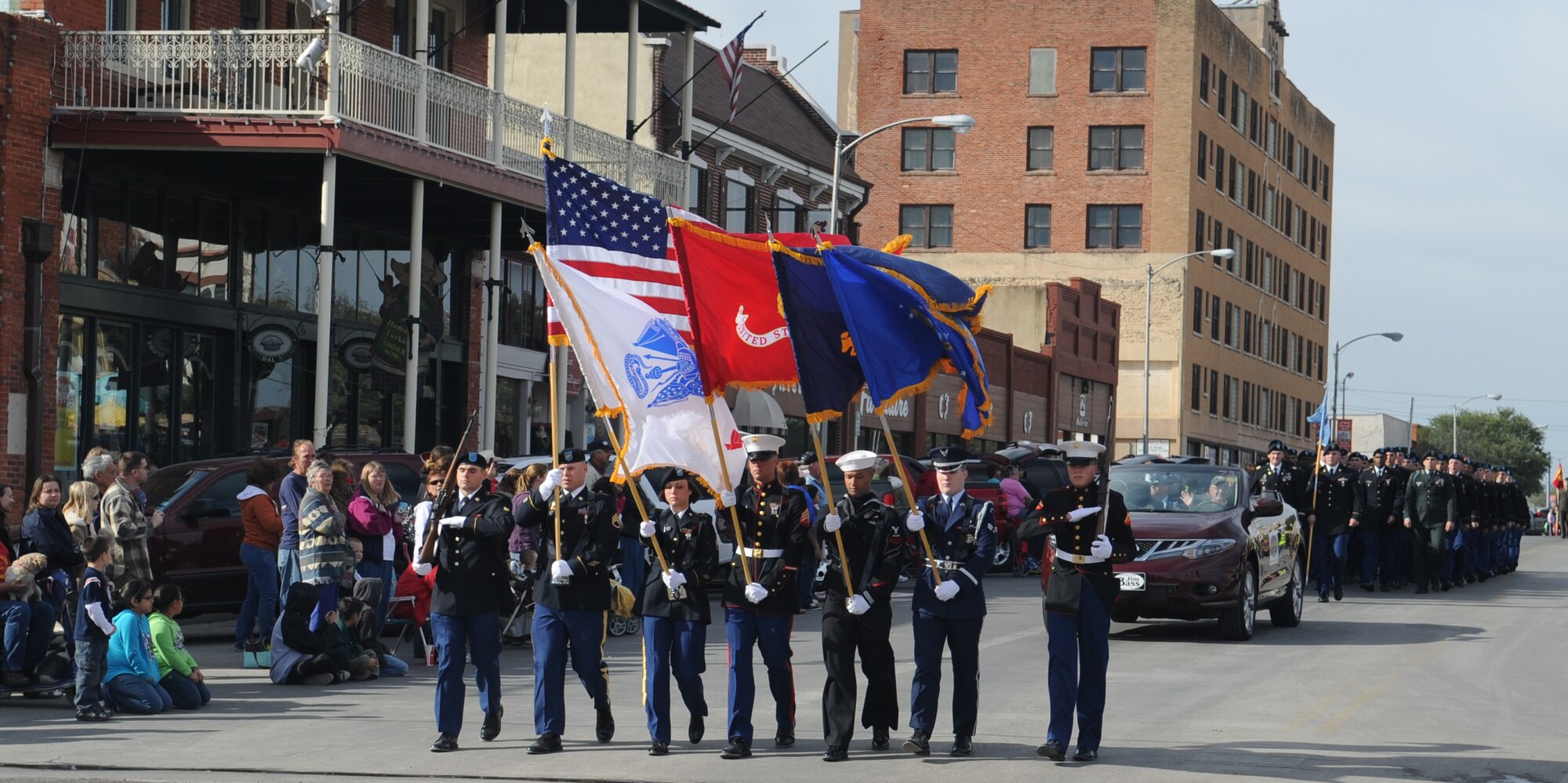 SAN ANGELO, Texas -- The Joint Color Guard from Goodfellow Air Force Base participates in the San Angelo Veterans Day Parade Nov. 5. The city hosted its eighth annual parade in honor of those serving and who have served our country. (U.S. Air Force photo/Staff Sgt. Laura R. McFarlane)
