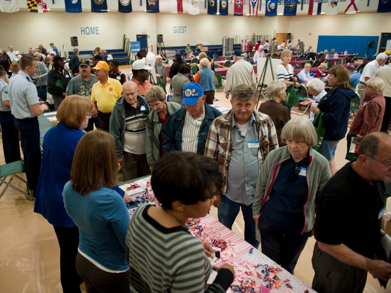 Retirees and their families take part in a health and information fair during Retiree Appreciation Day at the Freedom I Fitness Center, Moody Air Force Base, Ga., Nov. 5, 2011. Various members from on- and off-base agencies set up displays and provided information on health, finance and products. (U.S. Air Force photo by Staff Sgt. Jamal D. Sutter/Released) 