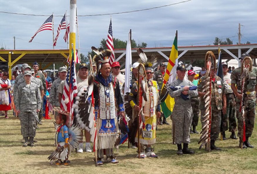 Fort Thompson, S.D. -- Health care providers from the 926th Aerospace Medicine Squadron and 99th Medical Group, Nellis Air Force Base, Nev., participate in a Pow Wow with members of the Crowe Creek Indian Reservation at the conclusion of a two-week visit. The total force medical team traveled to the reservation to augment U.S. Public Health Service officers assigned there. (U.S. Air Force photo/Lt. Col. Frances Razor)