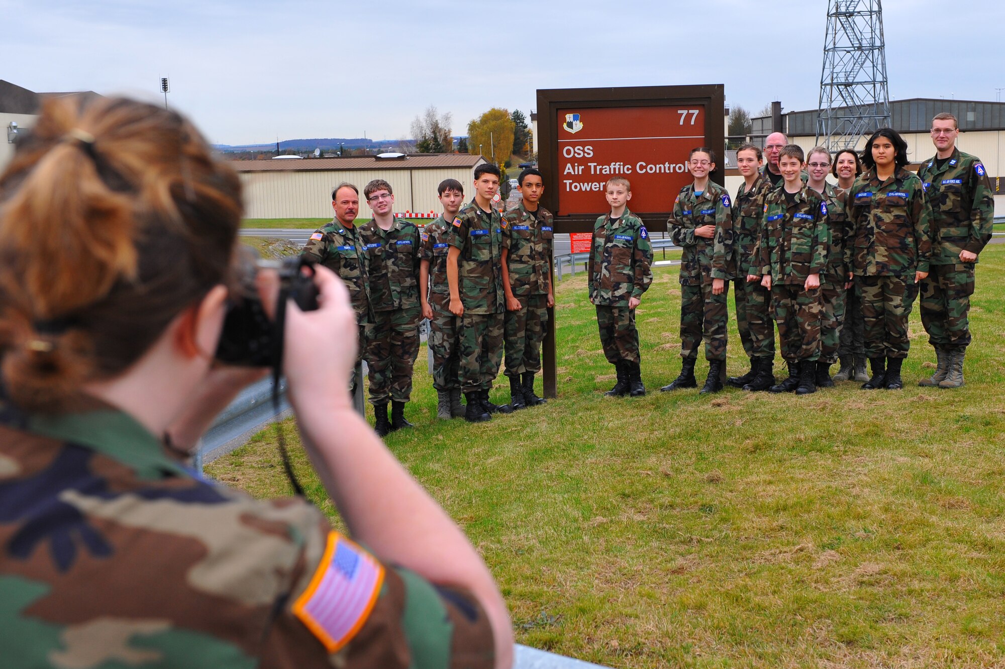 SPANGDAHLEM AIR BASE, Germany – Spangdahlem Civil Air Patrol commanders and their cadets take a group photo during their visit to the 52nd Operations Support Squadron control tower here Nov. 3. The cadets visited the control tower and ground radar office to get an inside look into the daily operations and jobs of the U.S. Air Force. CAP helps teenagers ages 12 to 19 push themselves to progress through a 16-step program that includes aerospace education, leadership training, physical fitness and moral leadership. (U.S. Air Force photo/Airman 1st Class Dillon Davis)
