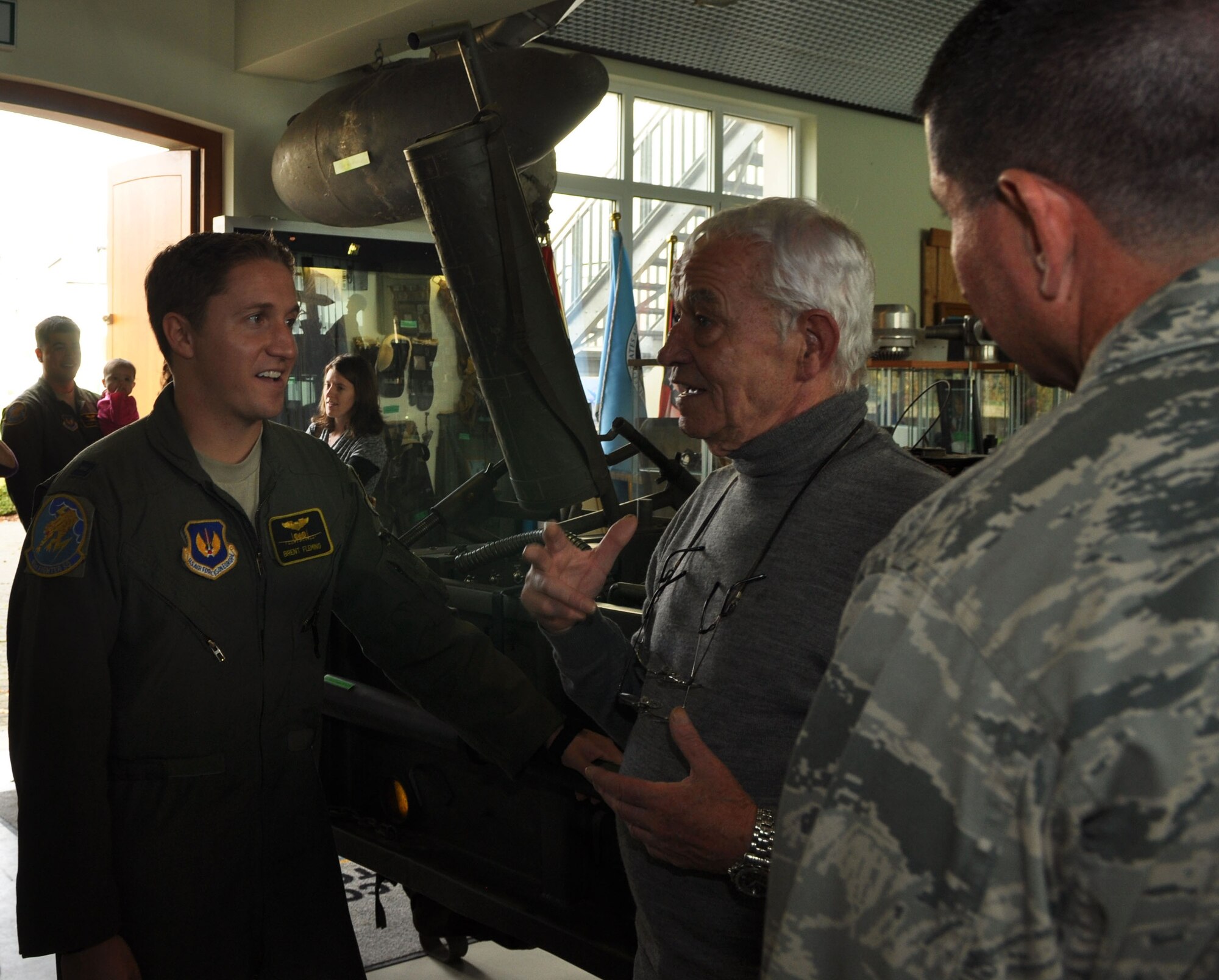 PERLE, Luxembourg -- Roger Feller, 81st Fighter Squadron honorary commander, tells members of the 81st Fighter Squadron about the World War II artifacts displayed in the 385th Bomb Group Museum here. The visit to this museum was part of an 81st FS family day. The Airmen and their families also visited other WWII memorials dedicated to the soldiers who lost and risked their lives to liberate Belgium and Luxembourg in WWII. (U.S. Air Force photo/Senior Airman Natasha Stannard)