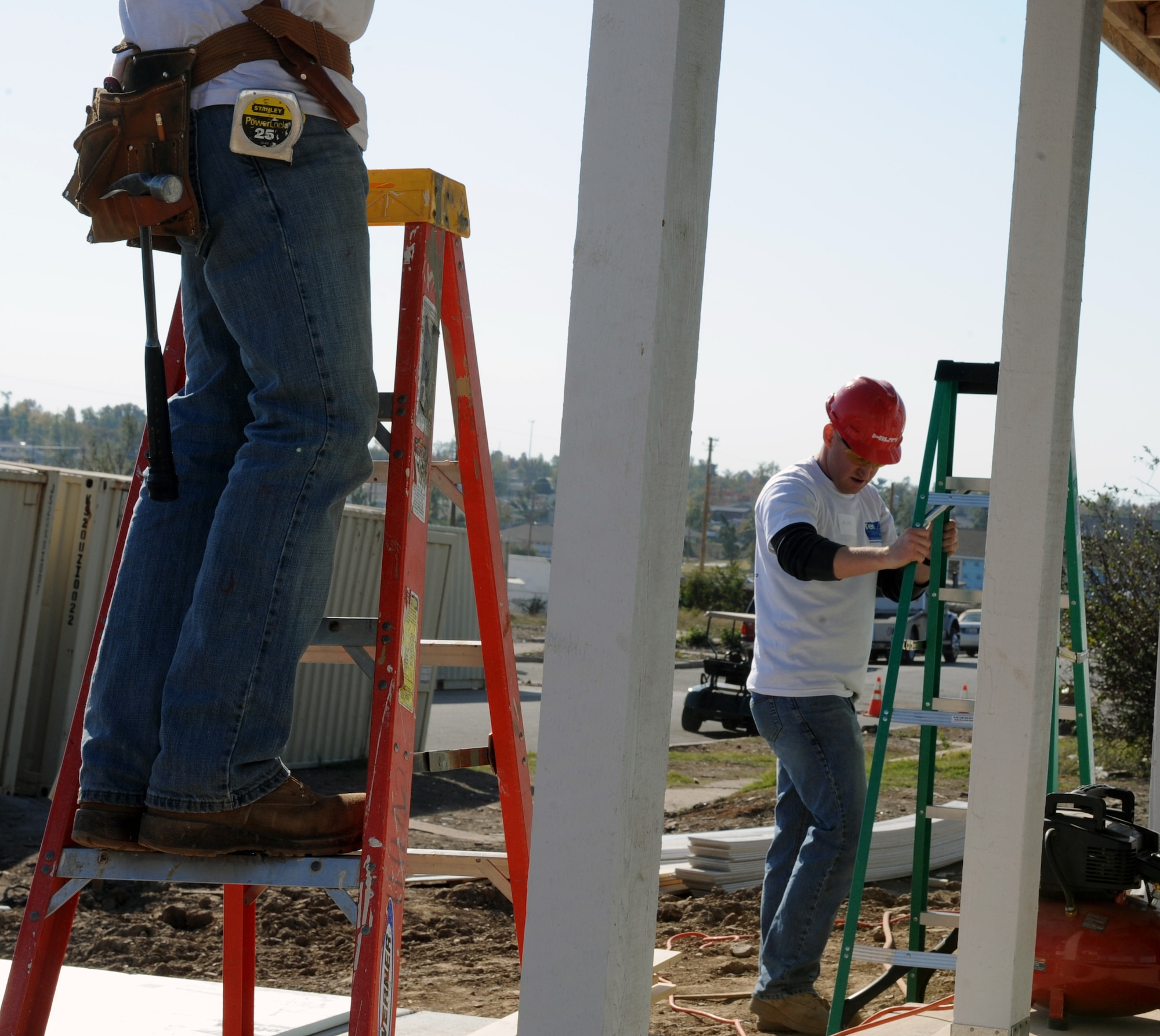 JOPLIN, Mo. -- Airman assigned to the 509th Civil Engineer Squadron at Whiteman Air Force Base volunteer to help Habitat for Humanity build 10 homes in 10 days for local residents Nov. 1. Joplin residents lost their homes during a tornado that caused a reported three billion dollars of damage to the small town. (U.S. Air Force photo/Senior Airman Laura Goodgame) 