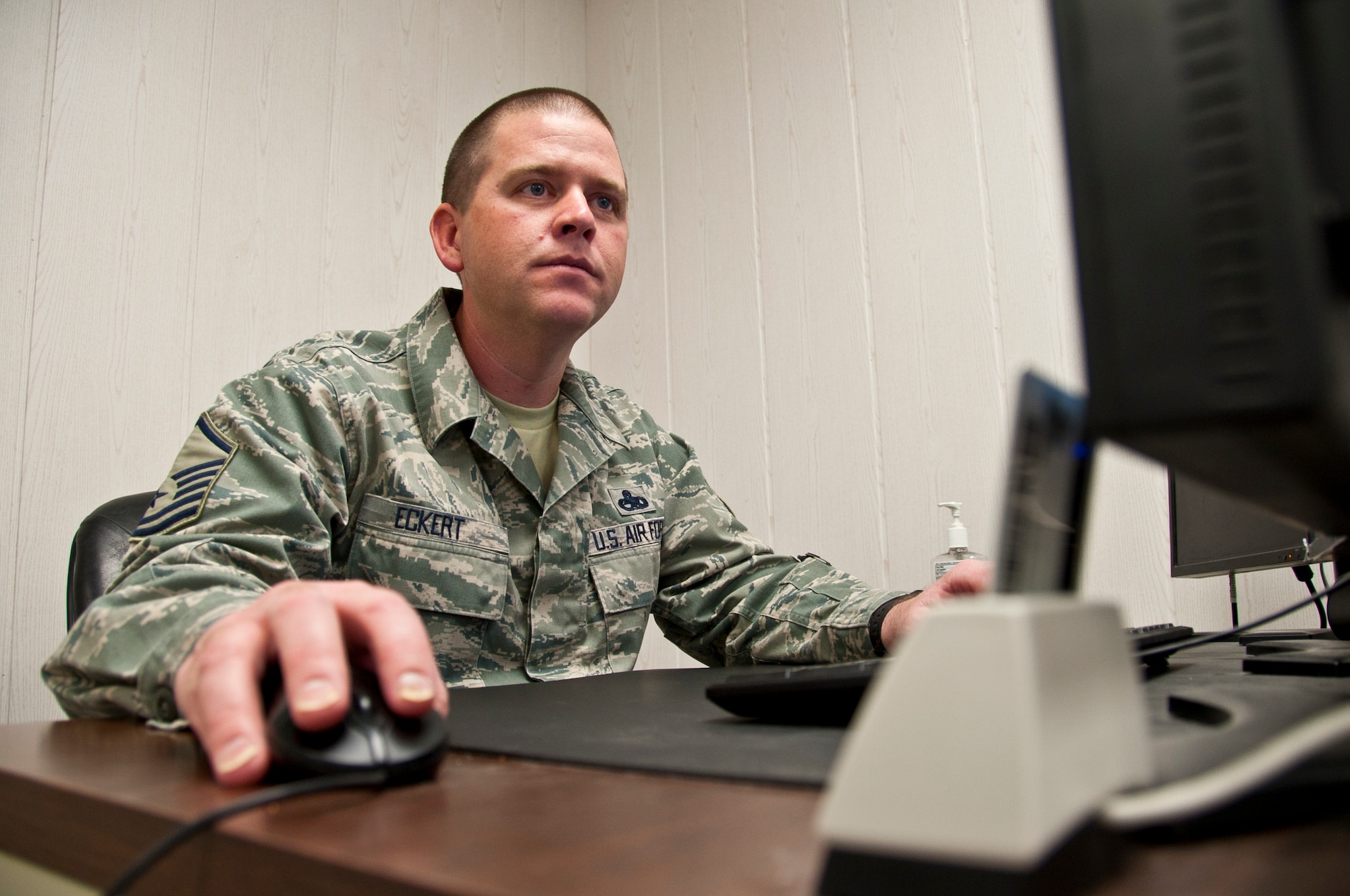 KANDAHAR AIRFIELD, Afghanistan – Master Sgt. Charles Eckert, 451st Expeditionary Maintenance Squadron analysis flight, looks over some maintenance data Nov. 7, 2011. Eckert is deployed from Royal Air Force Lakenheath, England, and is a St. Louis, Mo., native. (U.S. Air Force photo by Senior Airman David Carbajal)