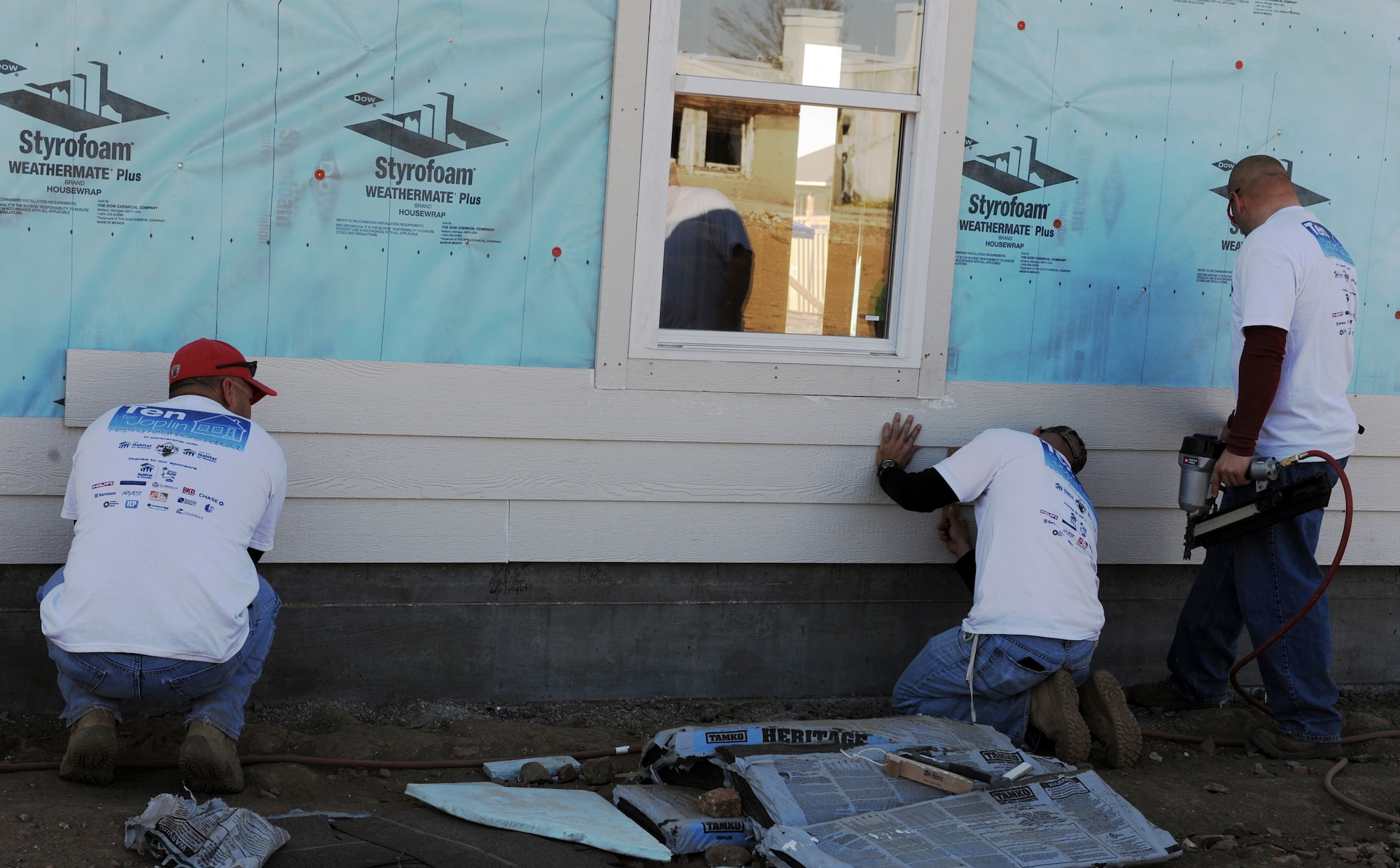 JOPLIN, Mo. -- Airmen assigned to the 509th Civil Engineer Squadron at Whiteman Air Force Base volunteered alongside Habitat for Humanity to build 10 homes in 10 days for the residents who lost their homes in a tornado that reap over three billion dollars in damages to the city. (U.S. Air Force photo/Senior Airman Laura Goodgame)
