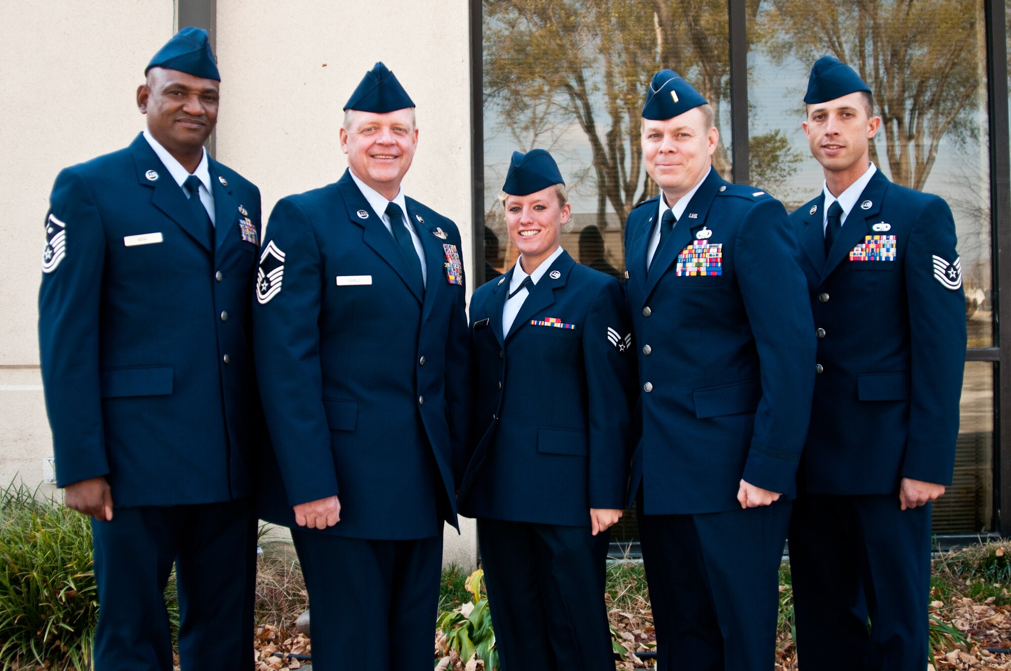 The winners of the Airmen of the Year and Officer of the Year Awards on Nov.  5, 2011: (left) First Sgt. DeJuan Neal, Senior Master Sgt. Robert Shalz, Senior Airman Kalonie Taylor, 2nd Lt. Robert Lovelady, and Tech. Sgt. Fredrick Pierce. These winners will go on to compete with other winners throughout the state. (Photo by Senior Airman Katie Kidd/Missouri Air National Guard)