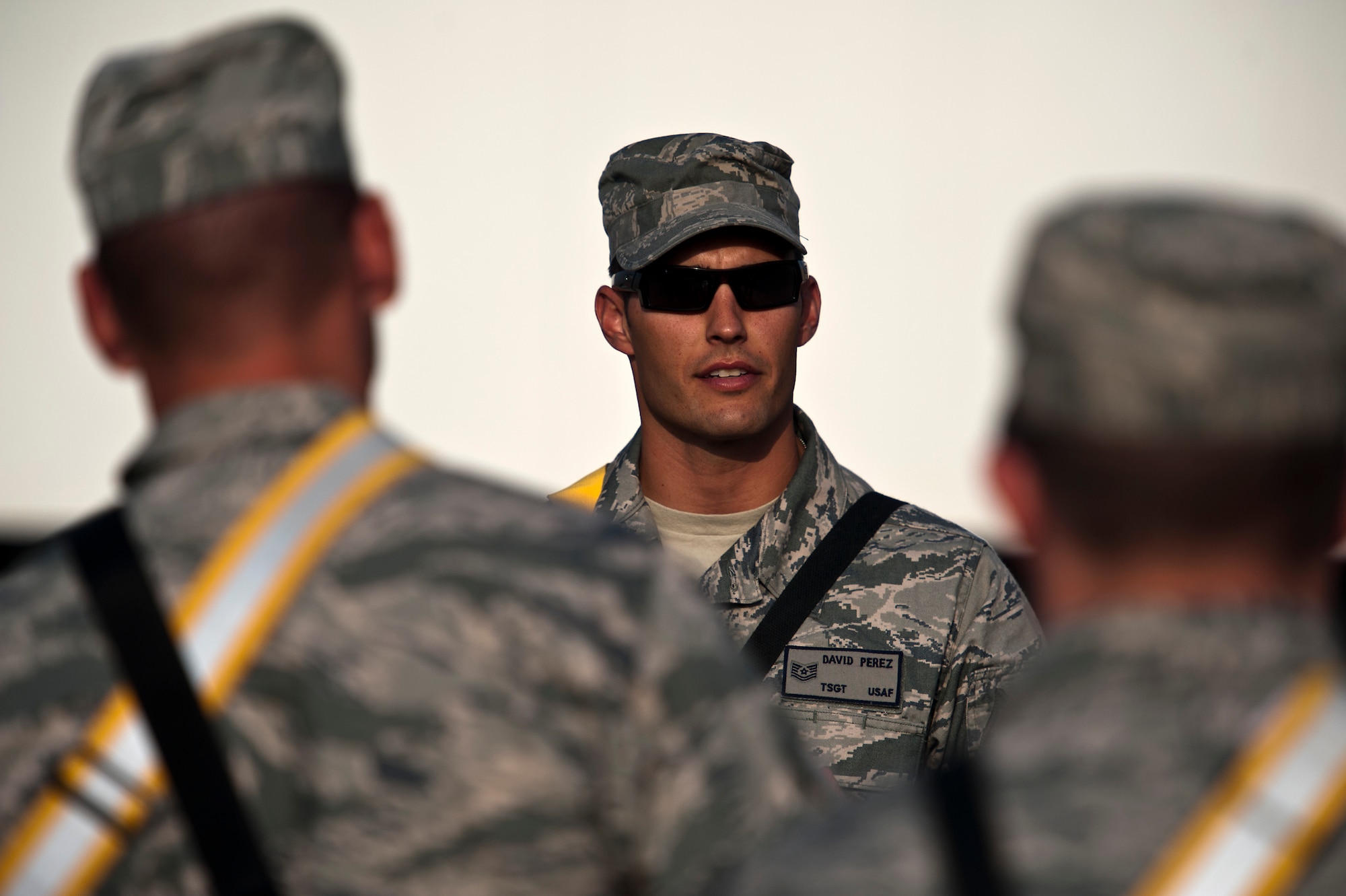 U.S. Air Force Tech. Sgt. David Perez, convoy commander, 70th medium truck detachment and Santa Fe, NM. native, briefs his team on convoy tactics before departing on a mission to transport equipment out of Iraq on Oct. 23, 2011. Perez is responsible for moving a convoy of 43 vehicles and 60 passengers more than 1,100 miles through Iraq. Members of the 70th MTD are hauling equipment out of Iraq to meet the deadline for the U.S. military transition from Iraq. (U.S. Air Force Photo/Master Sgt. Jeffrey Allen)