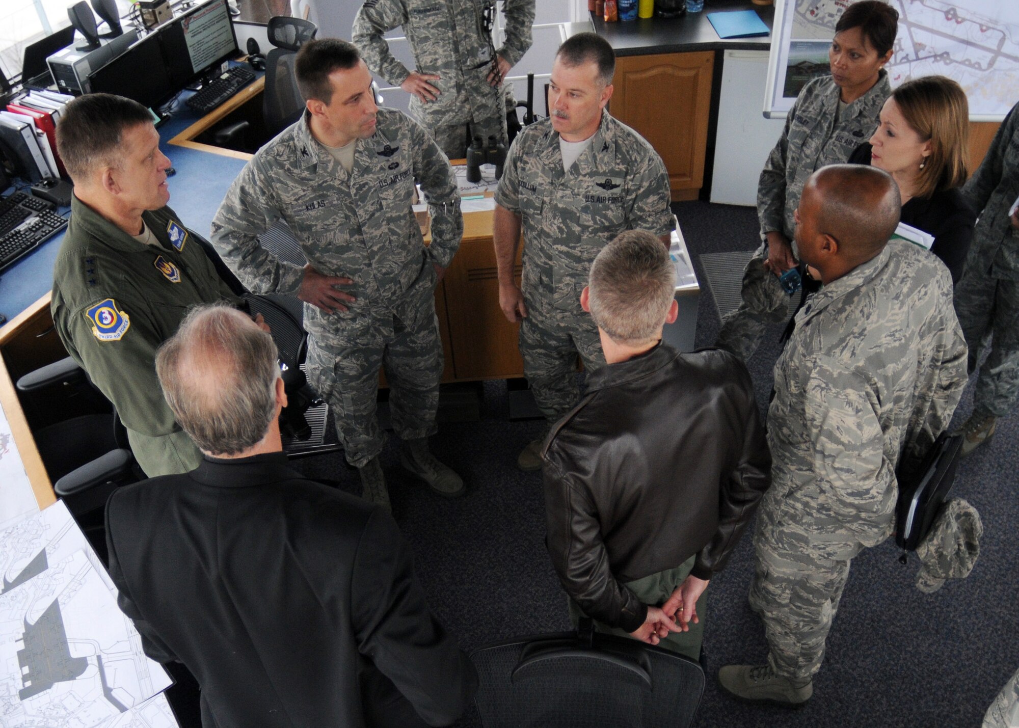 RAF MILDENHALL, England – Lt. Gen. Frank Gorenc, 3rd Air Force commander (left), speaks with leadership from several base organizations about the future vision of RAF Mildenhall at the air traffic control tower here Nov. 4, 2011.  Future improvements to the base will expand mission capabilities and enhance overall mission accomplishment.   (U.S. Air Force photo/Staff Sgt. Tabitha M. Lee) 