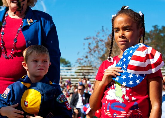 Eglin Elementary students participate in a moment of silence honoring fallen heroes during the annual Veteran's Day ceremony at the All Wars Memorial Nov. 8 at Eglin Air Force Base, Fla. More than 400 students attended the ceremony. (U.S. Air Force photo/Sachel Seabrook) 