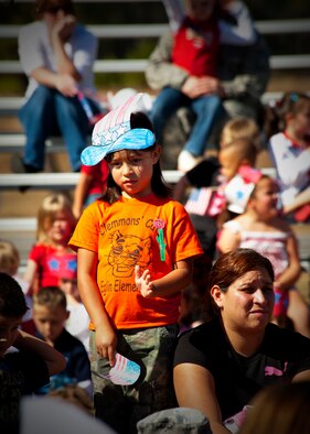 An Eglin Elementary School student watches the Veterans Day ceremony at the All Wars Memorial at Eglin Air Force Base, Fla., Nov. 8.  (U.S. Air Force photo/Sachel Seabrook)