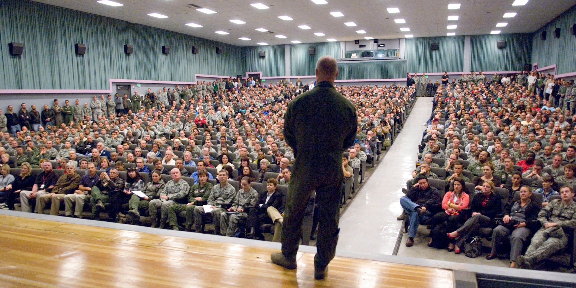 Brig. Gen. Robert C. Nolan II, commander, Air Force Flight Test Center, addresses a packed house at a commander’s call Nov. 4 at the Base Theater. Nolan discussed with Team Edwards how recently announced changes in the Air Force and Air Force Materiel Command will impact the base. (U.S. AIr Force Photo by Civ/Edward Cannon) 