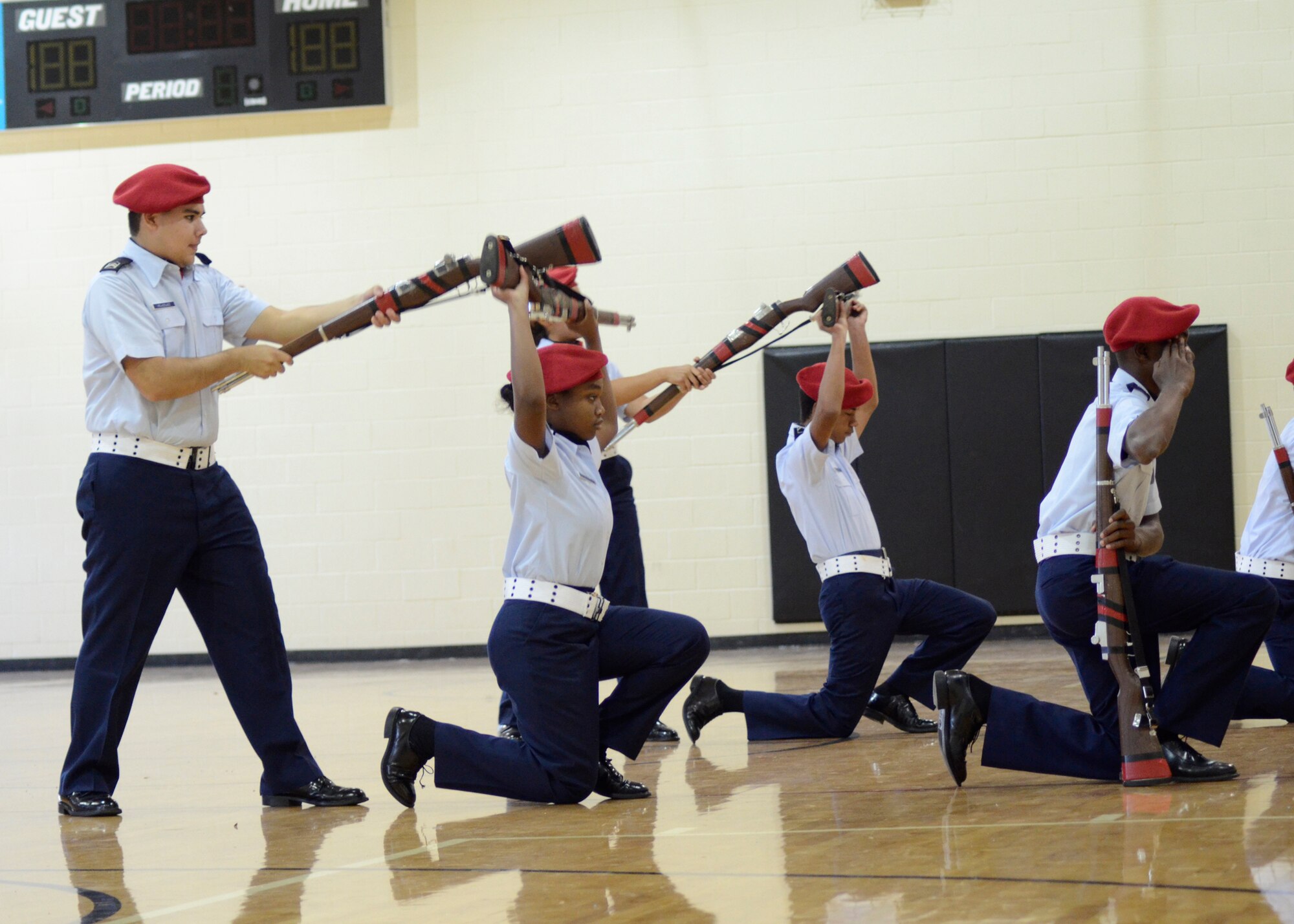 Dutchtown High School Air Force JROTC cadets execute their “Ninja” routine during their Armed Exhibition performance during the Armed Exhibition competition event at  the  Southern Invitational Drill Team Competition on Nov. 5 at East Paulding High School.  (U.S. Air Force photo/Master Sgt. Stan Coleman)      