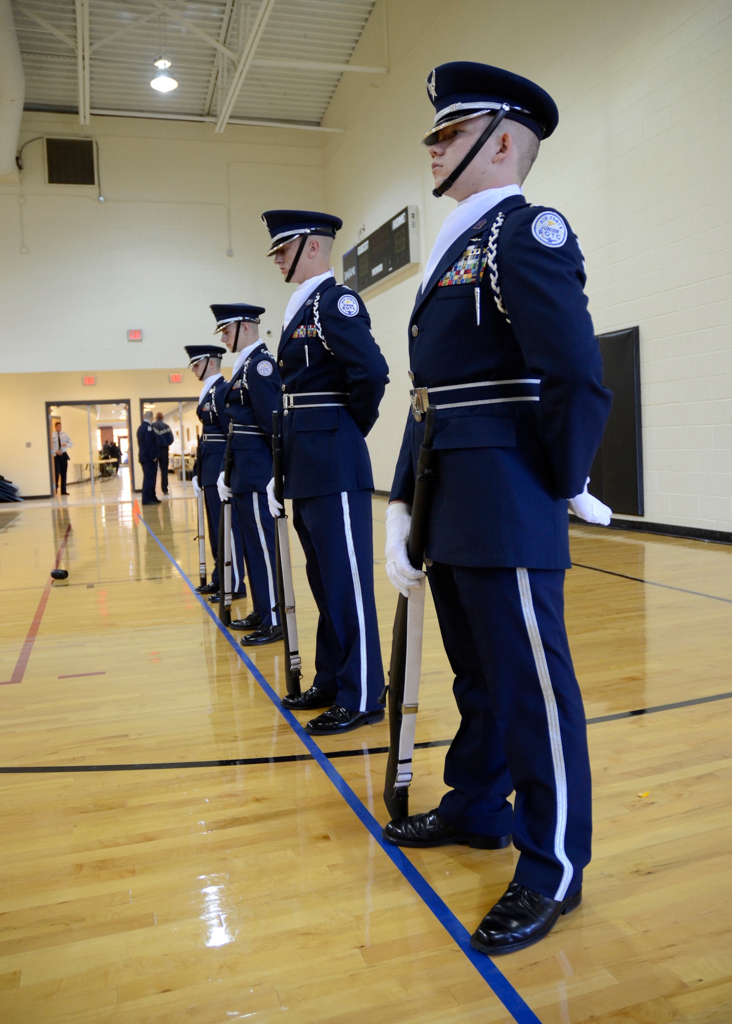 Newnan High School Air force JROTC cadets exemplify military drill and ceremony discipline at parade rest before their performance during the Armed Exhibition competition event during the Southern Invitational Drill Team Competition on Nov. 5 at East Paulding High School.  (U.S. Air Force photo/Master Sgt. Stan Coleman)
