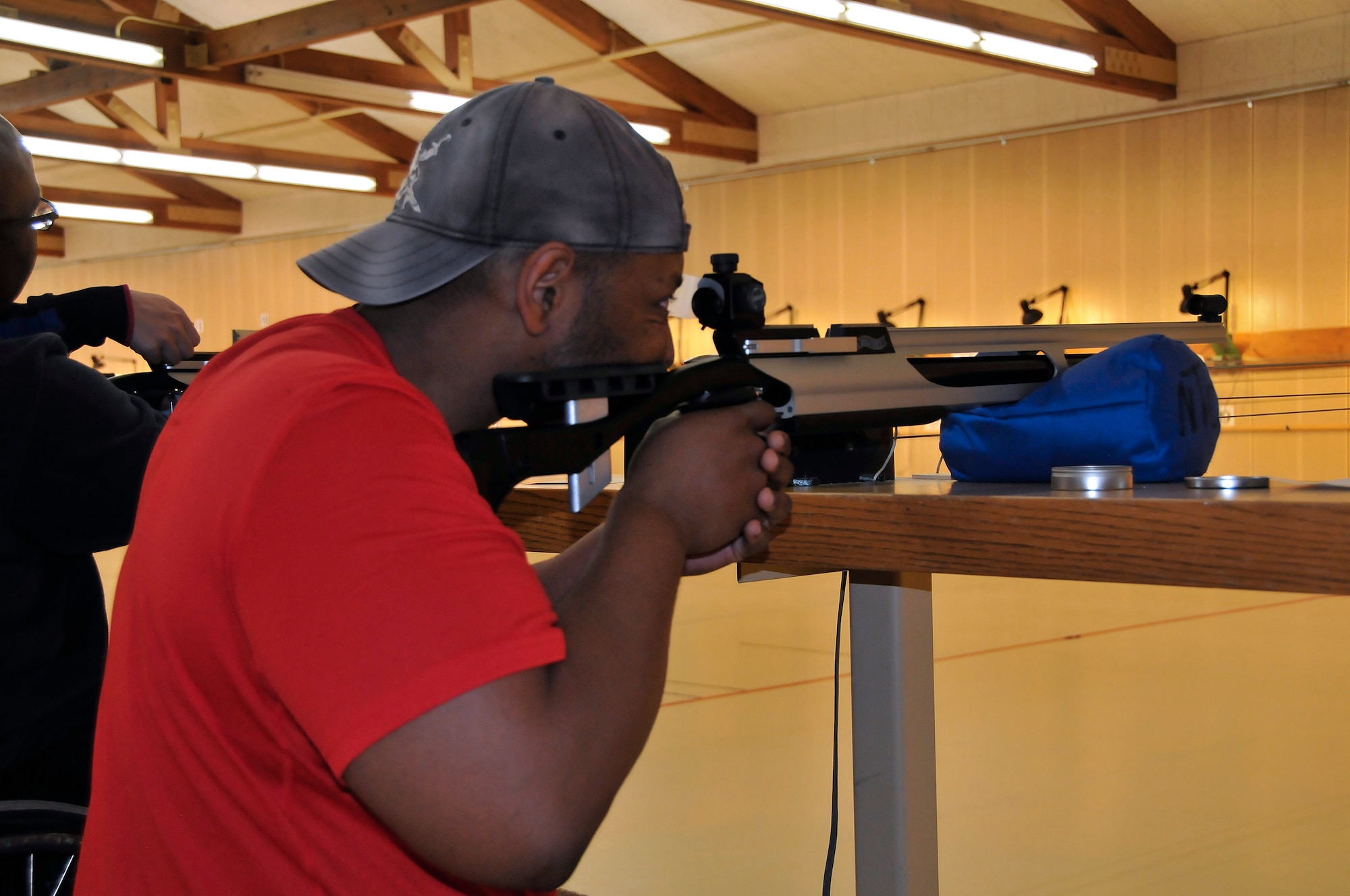 Rodney Bryant, one of the 15 athletes participating in the Air Force’s Adaptive Sports Wounded Warrior Mini Camp, lines up his shot at the Shooting Center in the Olympic Training Center, Nov. 4. The camp was held at the OTC and the U.S. Air Force Academy, and ran from Nov. 3 to 6. (U.S. Air Force Photo/ Capt. George Tobias)