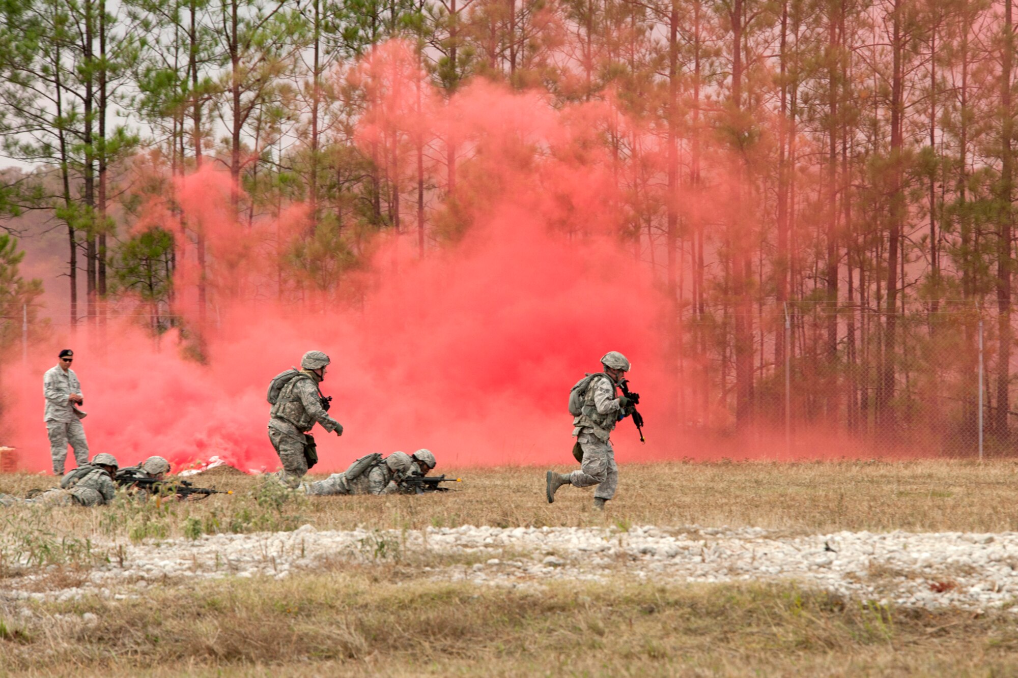 Members of the 307th Security Forces Squadron provide fire and cover for each other as part of the Mental and Physical (MAP) competition during the Global Strike Challenge 2011, Barksdale Air Force Base, La., Nov. 7, 2011. The MAP competition is a timed event and tests the logical and physical abilities of each security forces team participating in the event. (U.S. Air Force photo by Master Sgt. Greg Steele/Released)