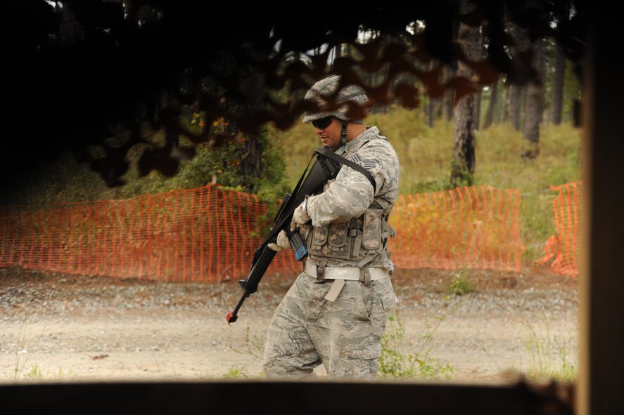 U.S. Air Force Staff Sgt.  Jose Gonzalez, 23rd Civil Engineer Squadron heating, ventilation, air conditioning and refrigeration technician, patrols his sector during Prime Base Engineer Emergency Forces training at Moody Air Force Base, Ga., Nov. 4, 2011. Members assigned to a Prime BEEF team are civil engineer forces organized for direct combat support or emergency recovery for natural disasters. (U.S. Air Force photo by Airman 1st Class Paul Francis/Released)
