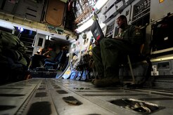 Staff Sgt. Kevin Sumlin troubleshoots an issue onboard a C-17 Globemaster III before a mission at Joint Base Charleston Nov. 2    Flying Crew Chiefs are trained in many specialized aircraft maintenance skills and provide universal support as the lone maintainer to fix most aircraft issues that may occur during a flying mission. Sumlin is flying crew chief with the 437th Aircraft Maintenance Squadron.  (U.S. Air Force photo/ Staff Sgt. Nicole Mickle)