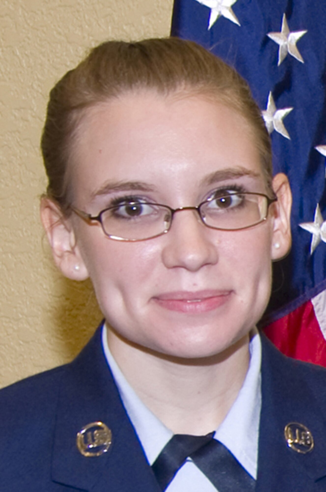 Staff Sgt. Tabitha Hickson, 345th Airlift Squadron, received a Pitsenbarger Award, an Embry Riddle University Award and a William Carey University Award during the Nov. 2, 2011, Community College of the Air Force commencement ceremony at Bay Breeze Event Center at Keesler Air Force Base, Miss. She is enrolled in the 2+2 nursing degree program with Mississippi Gulf Coast Community College.  (U.S. Air Force photo by Adam Bond)